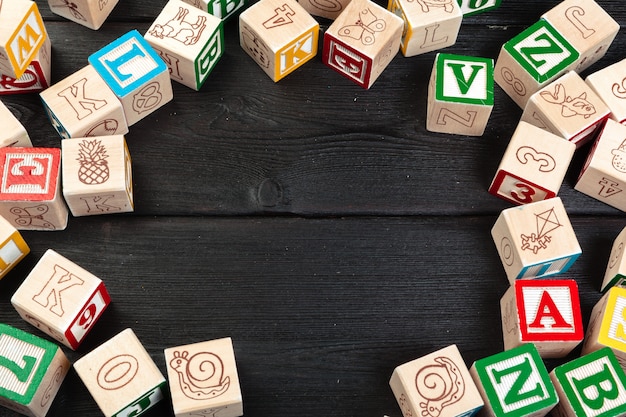 Letters in a wooden surface cubes with letters 