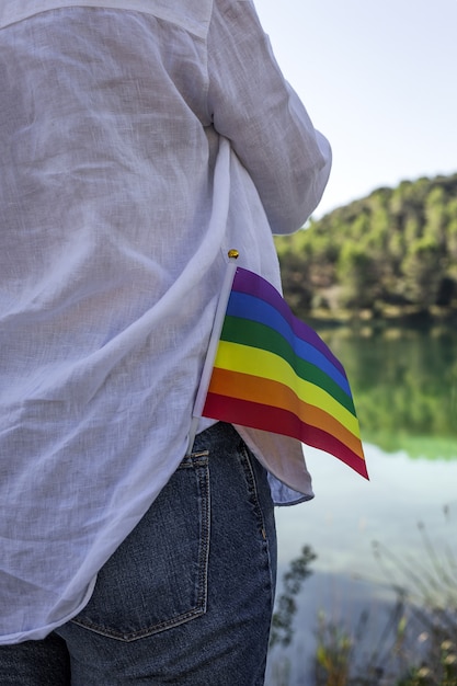 Photo lgbt flag in the field. pride. freedom concept