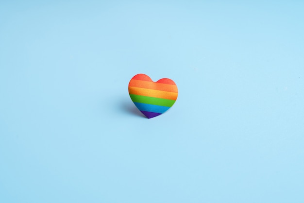 LGBTQ flag and symbol on table top view