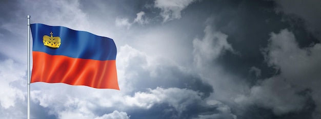 Liechtenstein flag on a cloudy sky