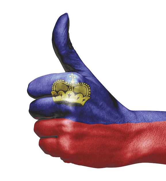 Photo liechtenstein flag on hand indicating approval on white background