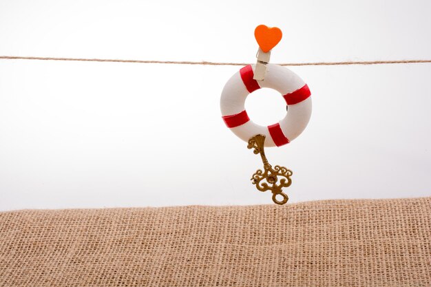 Life preserver attached to a string with heart