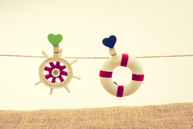 Life preserver and Steering wheel on a string