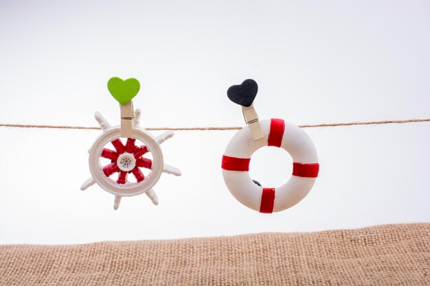 Life preserver and Steering wheel on a string