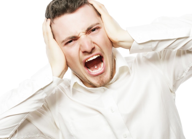 Life style, business  and people concept: young office worker mad by stress screaming isolated on white