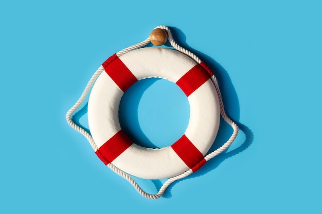 Lifebuoy on blue background Copy space