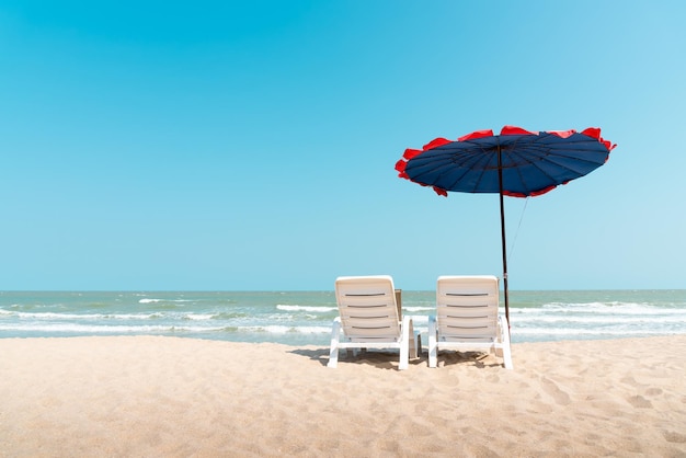 Lifeguard chair on beach against clear sky