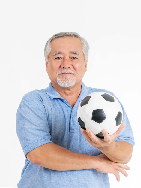 Lifestyle healthy senior man holding football soccer ball prepare for Cheer team favorite isolated on white background