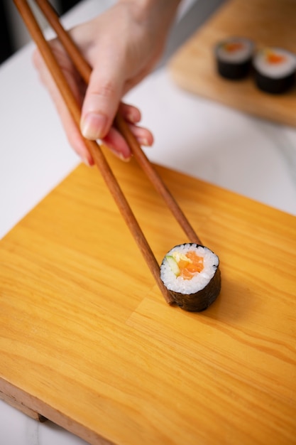 Lifestyle: people learning to make sushi