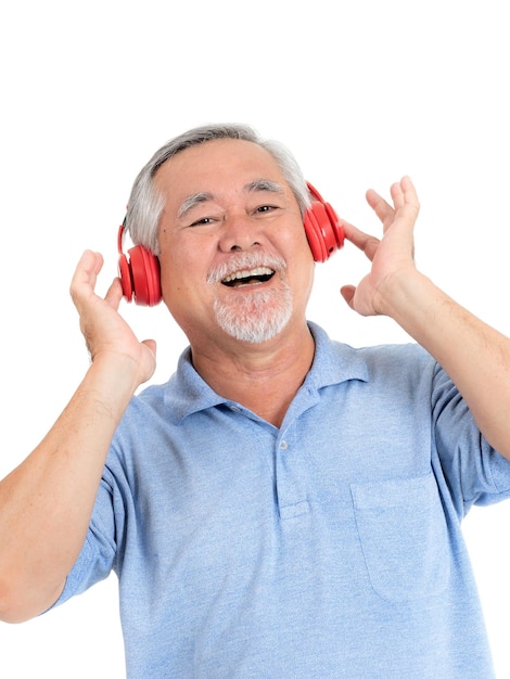 Lifestyle senior man feel happy enjoy listening to music with earphones headphones isolated on white background