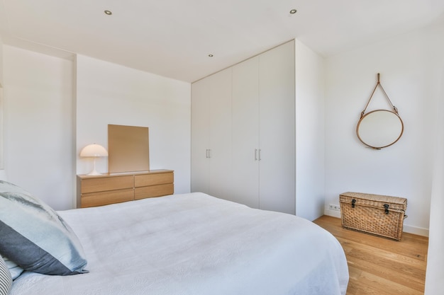 Light bedroom with wooden wardrobe