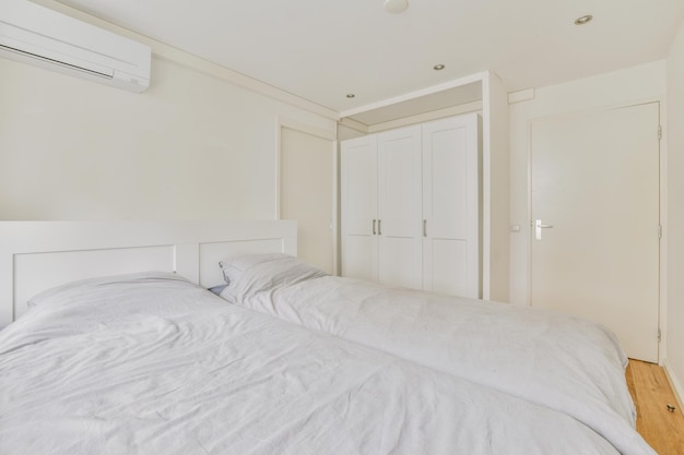 Light bedroom with wooden wardrobe