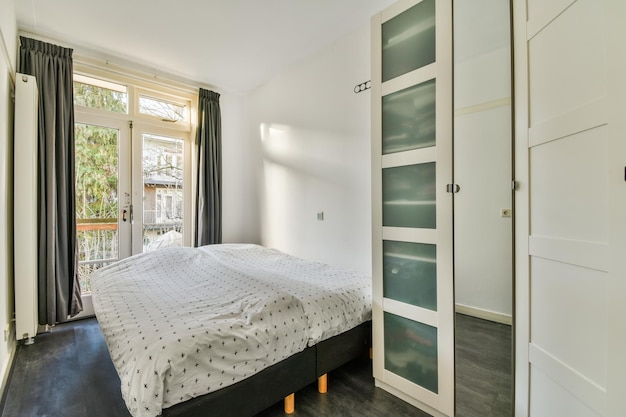 Light bedroom with wooden wardrobe