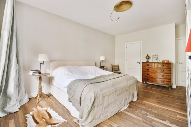 Light bedroom with wooden wardrobe