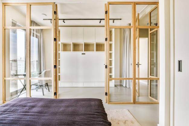 Light bedroom with wooden wardrobe