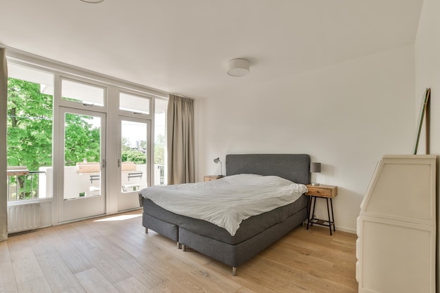 Light bedroom with wooden wardrobe