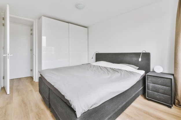 Light bedroom with wooden wardrobe