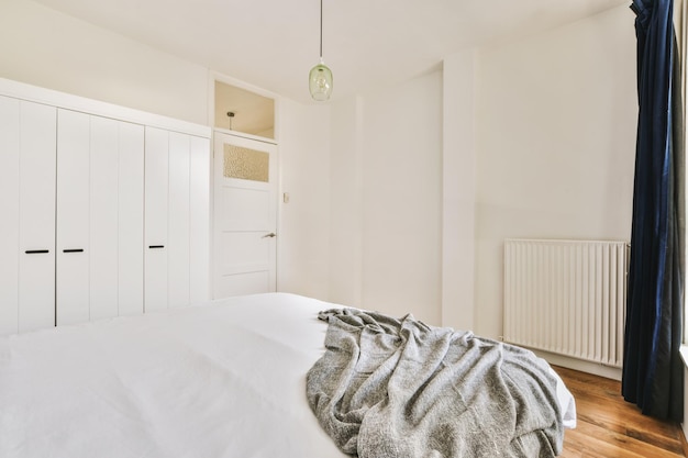 Light bedroom with wooden wardrobe