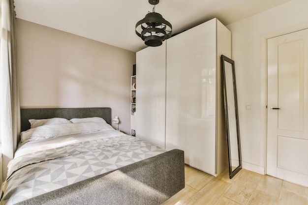 Light bedroom with wooden wardrobe