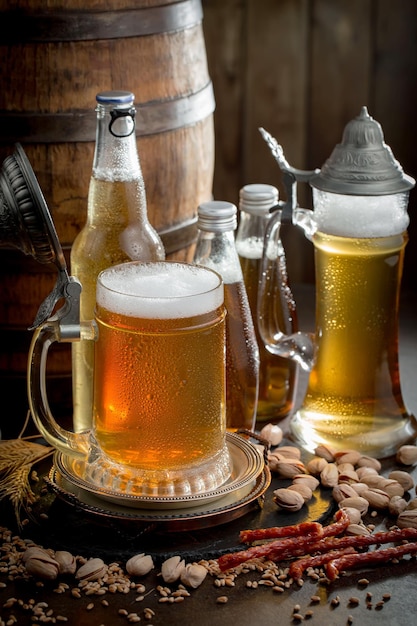 Light beer in a glass on an old background