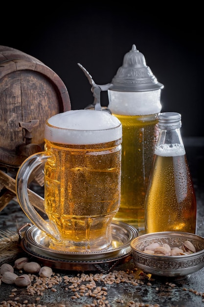 Light beer in a glass on an old background