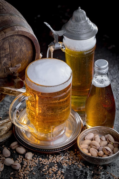 Light beer in a glass on an old background