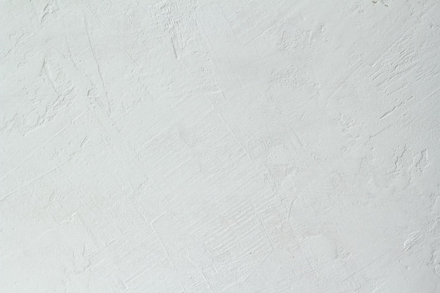 Light beige decorative and textured plaster repairs Background and texture