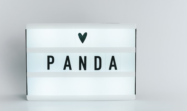 Light box with the headline PANDA with copyspace, over white background