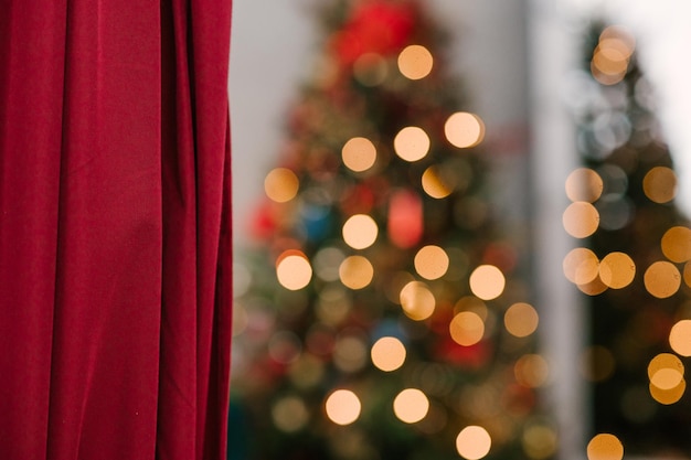 The light bulb on the Christmas tree with beautiful bokeh background