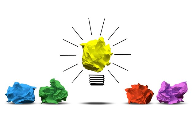 Light bulb icon and colorful crumpled papers idea creativity concept