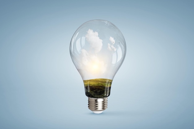 Light bulb on light blue background