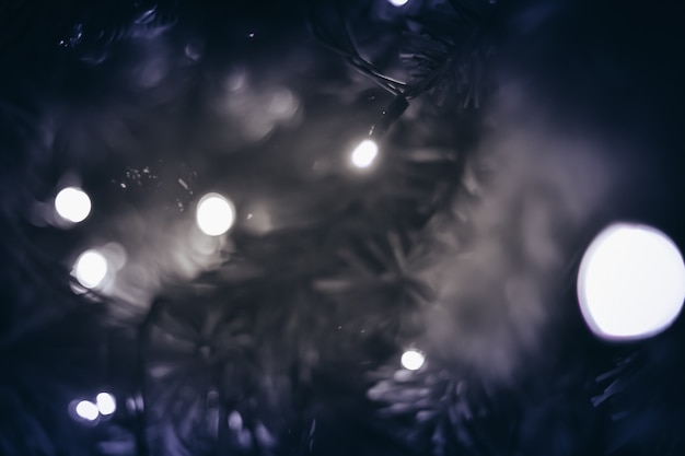 Light on christmas tree with bokeh for christmas and new year day