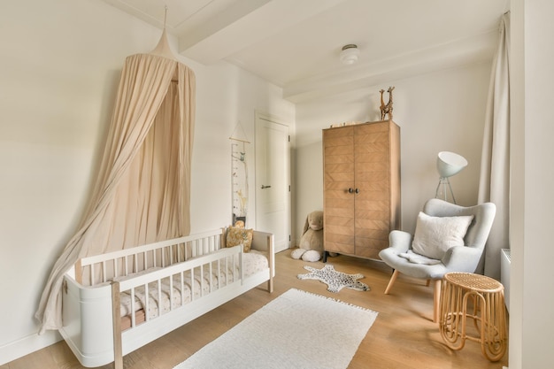 Light cozy baby room with cot