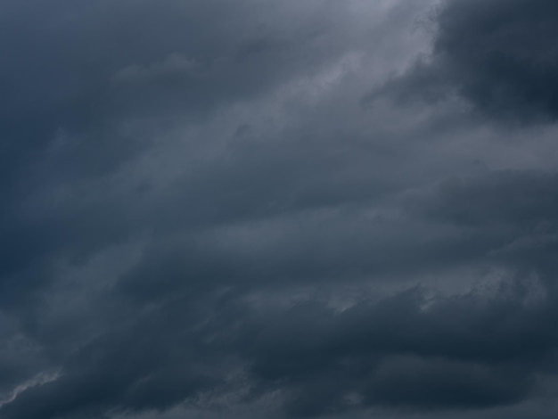 Light in the Dark and Dramatic Storm Clouds background