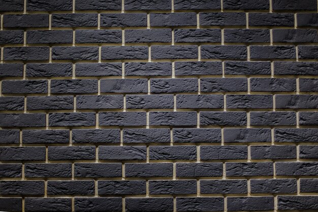 Light gray brick wall, creative back-phonon closeup