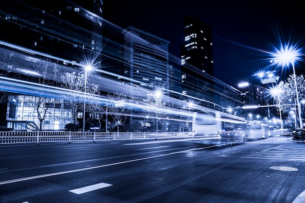 The light trace of the background of modern urban architecture with blue tone