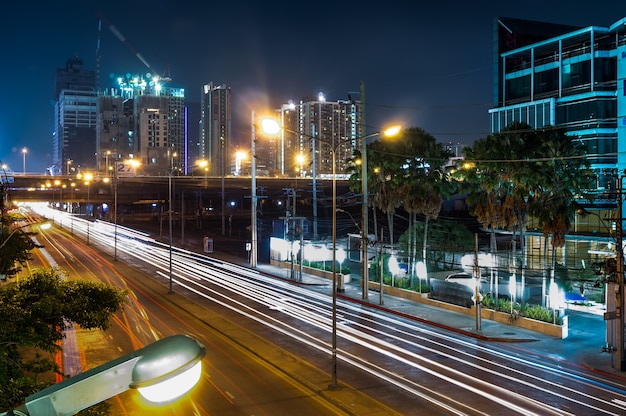 Light trails of car light on city road at night in Bangkok