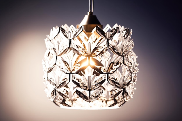 A light with a silver pendant light that has a diamond design