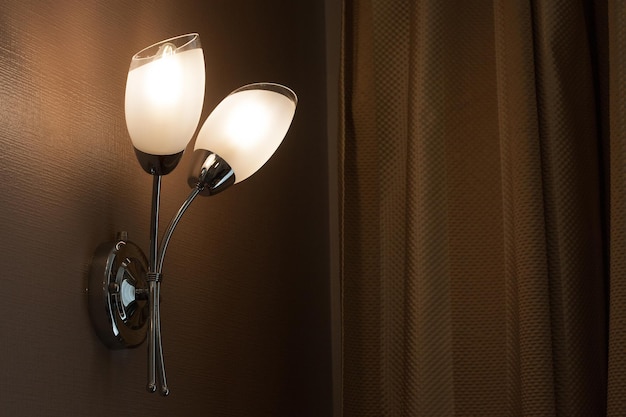 Lighted classic sconce on the wall