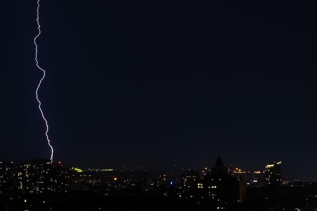 Lightning strike over night city