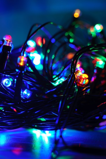 Lights of a lit new year garland at night, close up