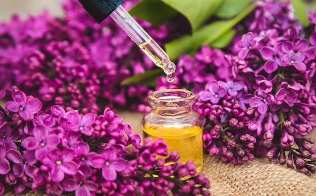 Lilac essential oil in a small bottle