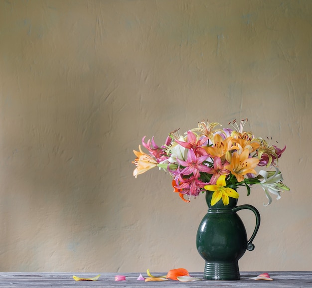 Lily in a ceramic green jug