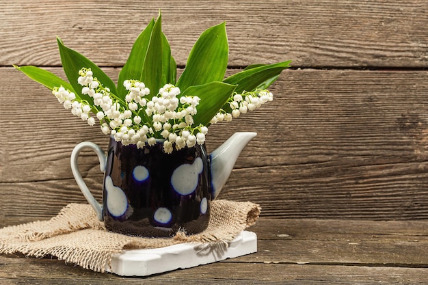 Lily valley flowers bouquet with green leaves Nature object for the design of festive greeting card