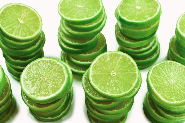 Photo lime slices isolated on white background. space for text or design.