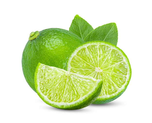 Lime with leaves on white wall