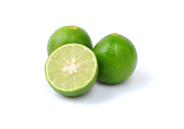 Lime with slices isolated on white