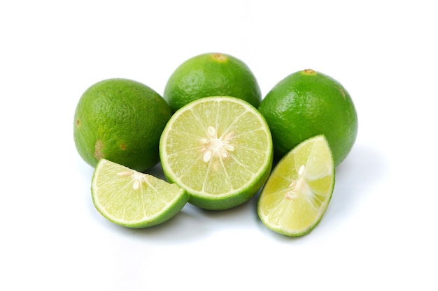 Lime with slices isolated on white