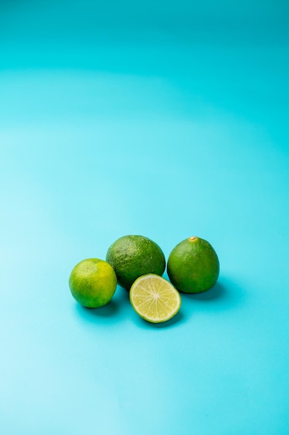 Photo limes photographed on a light blue background