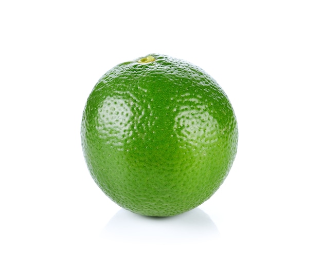 Limes with slices isolated on white